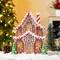 Glitzhome® 11.75" Christmas Lighted Resin Village Table Decor